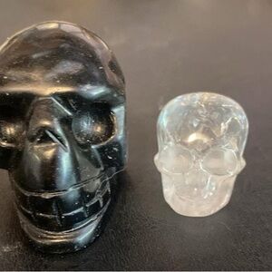 Obsidian and Clear Quartz Skull Carvings